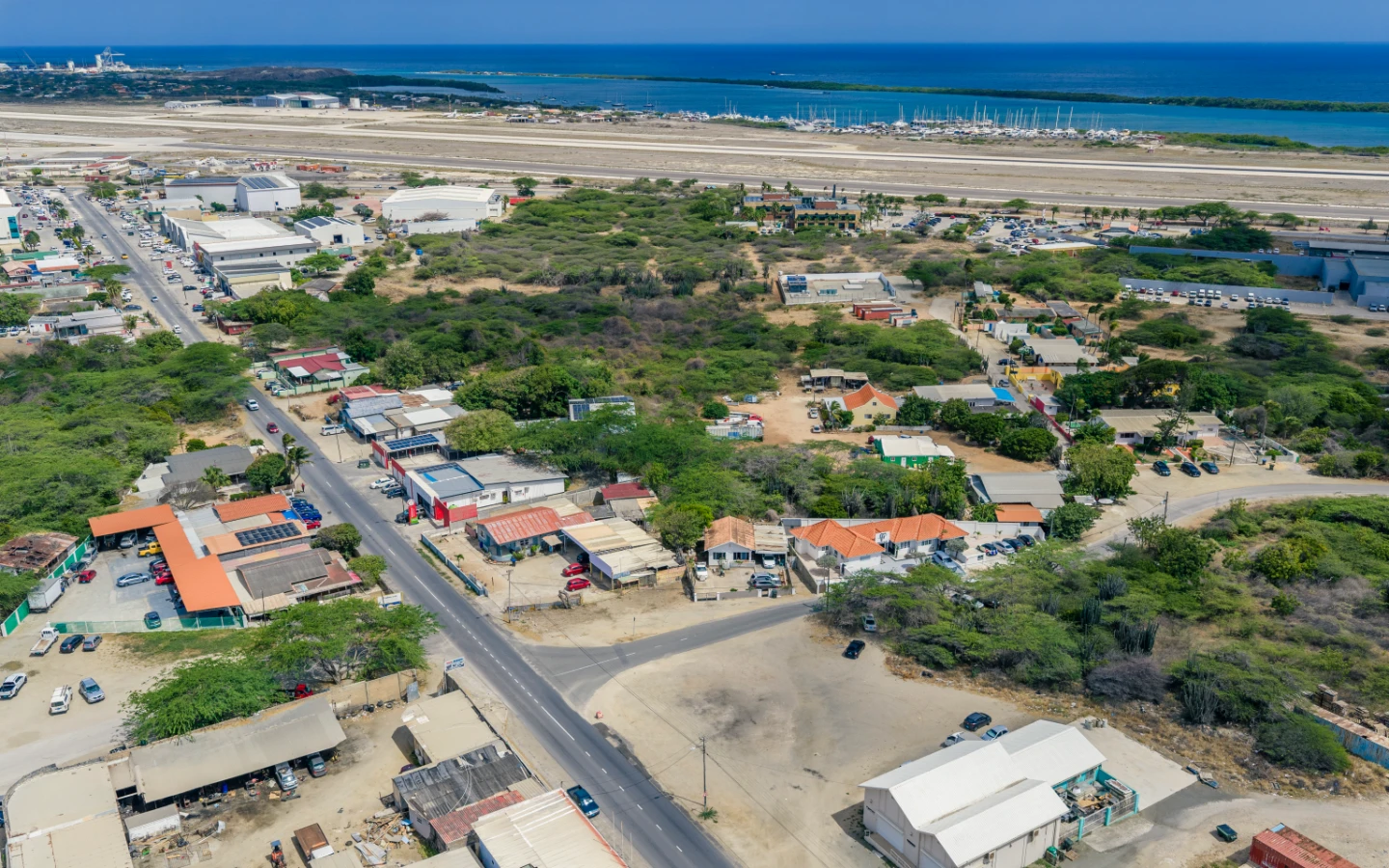 Aerial of the established residential neighborhood bordering the Camacuri parcel to the north