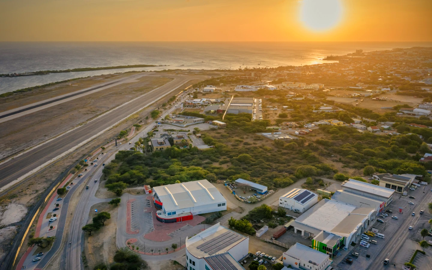 Aerial of the linear park and airport corridor running south of the Camacuri land in Aruba